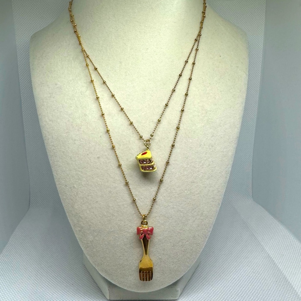 Betsey Johnson Gold Tone Layered Necklace with Pink Bow & Yellow Cake Charms